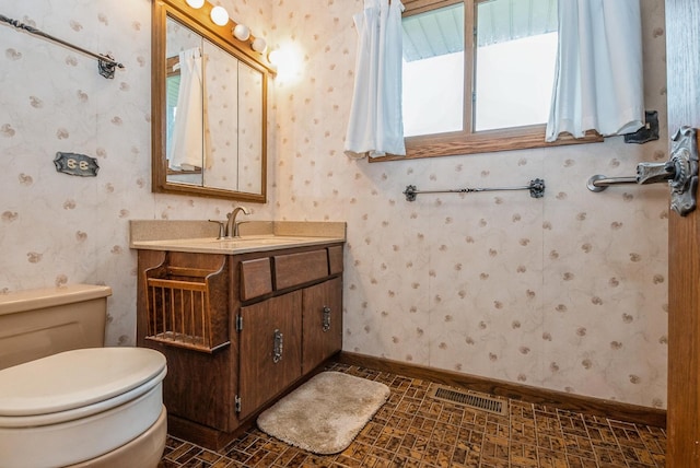 10756 Mason Ave, Chicago Ridge, IL 60415 - bathroom featuring wallpapered walls, toilet, and visible vents