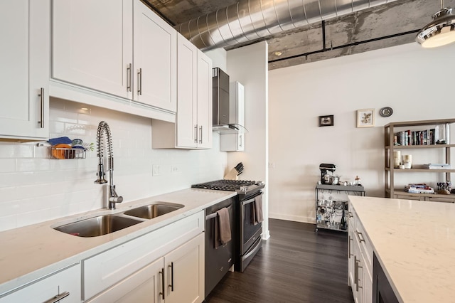 50 E 16th St Unit 1111, Chicago, IL 60616 - kitchen with a sink, wall chimney exhaust hood, appliances with stainless steel finishes, decorative backsplash, and dark wood-type flooring