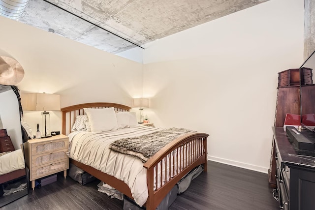 50 E 16th St Unit 1111, Chicago, IL 60616 - bedroom featuring dark wood-style flooring and baseboards