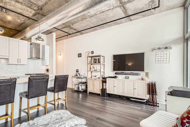 50 E 16th St Unit 1111, Chicago, IL 60616 - living area with dark wood-style floors and baseboards
