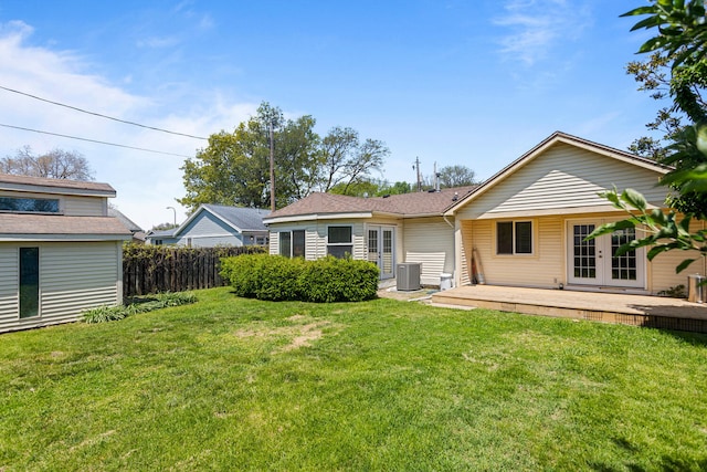 913 W Eads St, Urbana, IL 61801 - back of house featuring french doors and central AC