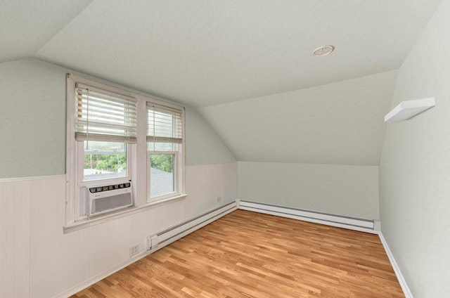 1607 Burlington Ave, Lisle, IL 60532 - bonus room with vaulted ceiling, light wood-style floors, cooling unit, a baseboard heating unit, and wainscoting