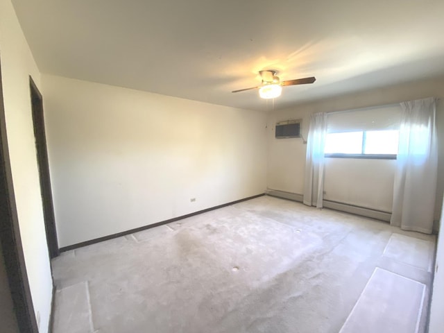 14643 Lamon Ave Unit 2A, Midlothian, IL 60445 - unfurnished room featuring light colored carpet, ceiling fan, a wall mounted air conditioner, and baseboard heating