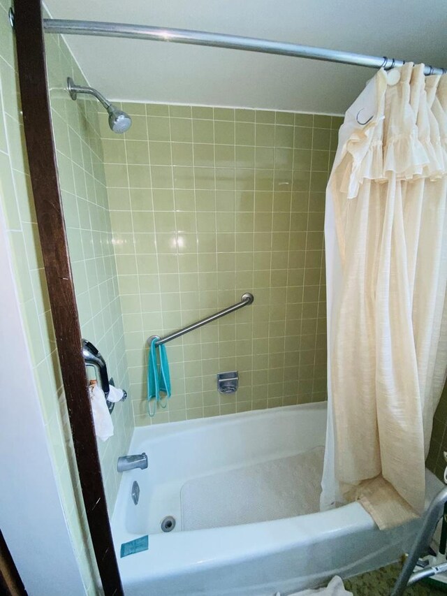 full bathroom featuring toilet, vanity, shower / bath combination with curtain, tile patterned floors, and baseboard heating