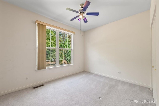 405 Lela Ln, Bartlett, IL 60103 - carpeted empty room featuring baseboards and ceiling fan