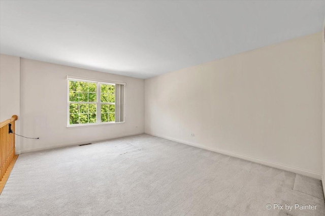 405 Lela Ln, Bartlett, IL 60103 - unfurnished room featuring light colored carpet and baseboards