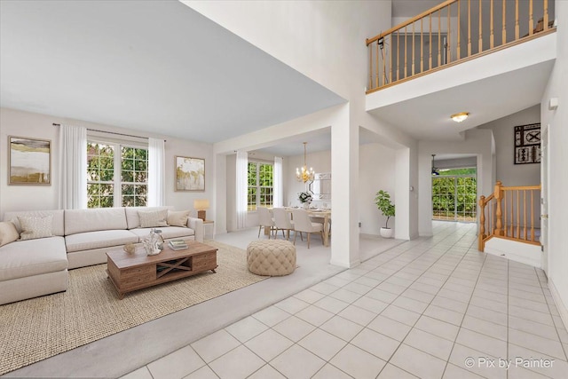 405 Lela Ln, Bartlett, IL 60103 - tiled living area featuring a chandelier and carpet