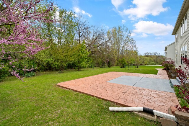 405 Lela Ln, Bartlett, IL 60103 - view of green lawn featuring a patio area