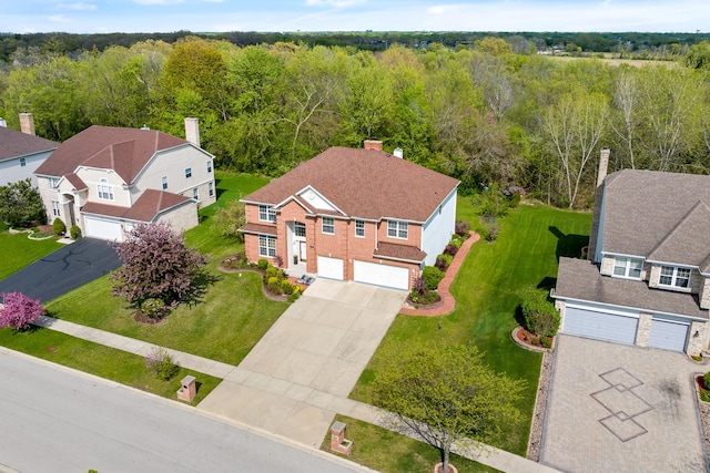 405 Lela Ln, Bartlett, IL 60103 - aerial view of residential area with a heavily wooded area