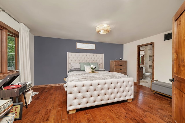 2588 Big Bluestem Rd, Morris, IL 60450 - bedroom featuring wood finished floors, ensuite bathroom, and baseboards