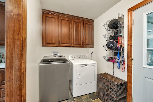 2588 Big Bluestem Rd, Morris, IL 60450 - washroom featuring cabinet space, washing machine and dryer, and stone finish floors