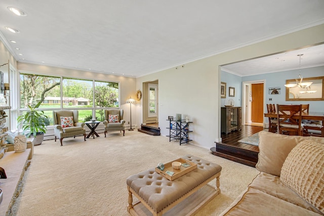 living area featuring carpet, crown molding, a chandelier, recessed lighting, and a baseboard heating unit