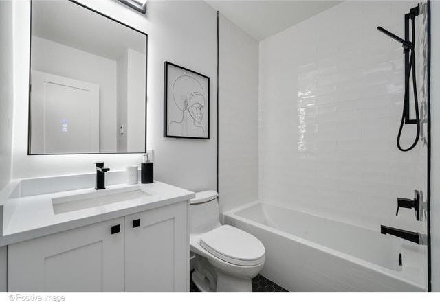 full bathroom with toilet, washtub / shower combination, and vanity