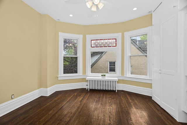 827 Madison St, Evanston, IL 60202 - spare room with radiator heating unit, wood finished floors, baseboards, ceiling fan, and recessed lighting