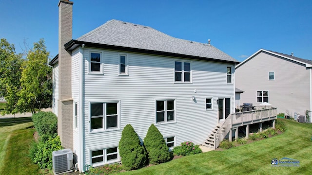 back of property featuring central AC, a chimney, a wooden deck, and stairway