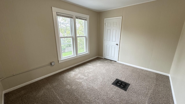 306 S Liberty St, Elgin, IL 60120 - carpeted empty room featuring baseboards