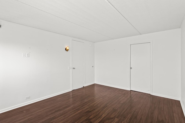 2020 St Johns Ave Unit 507, Highland Park, IL 60035 - unfurnished room with dark wood-type flooring and baseboards