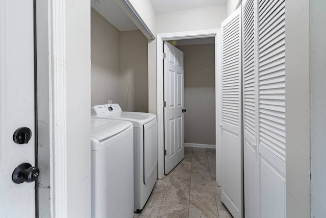 laundry area with washer and clothes dryer