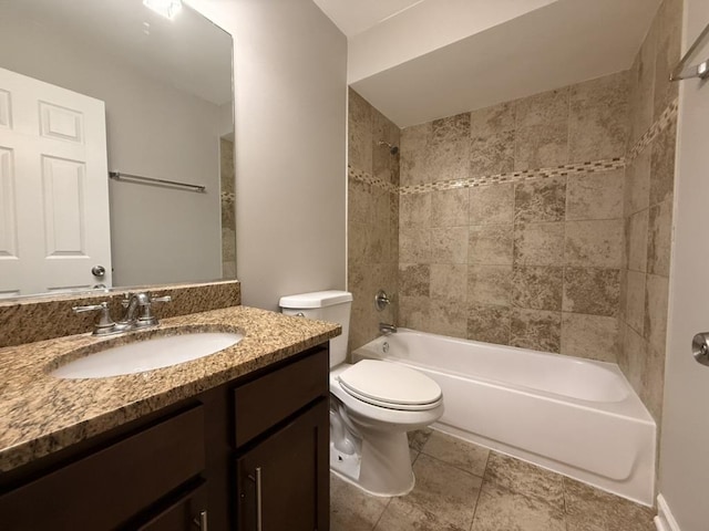 bathroom with toilet, vanity, and bathtub / shower combination