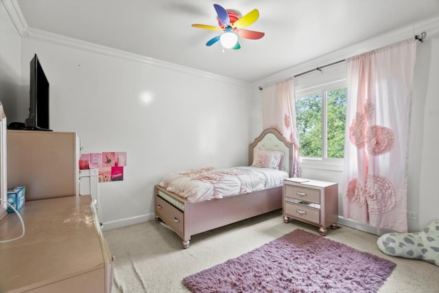 bedroom featuring crown molding, a ceiling fan, and baseboards