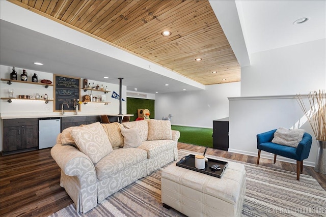 living area with wet bar, wood ceiling, dark wood finished floors, recessed lighting, and baseboards