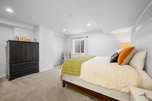 bedroom featuring light carpet, recessed lighting, and baseboards