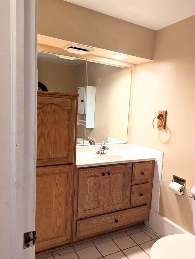 15508 Lavergne Ave, Oak Forest, IL 60452 - half bathroom with toilet, tile patterned flooring, and vanity