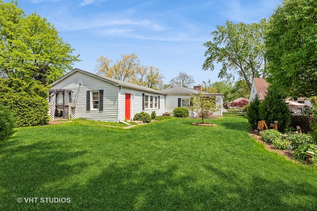 15508 Lavergne Ave, Oak Forest, IL 60452 - rear view of property with a lawn and a chimney