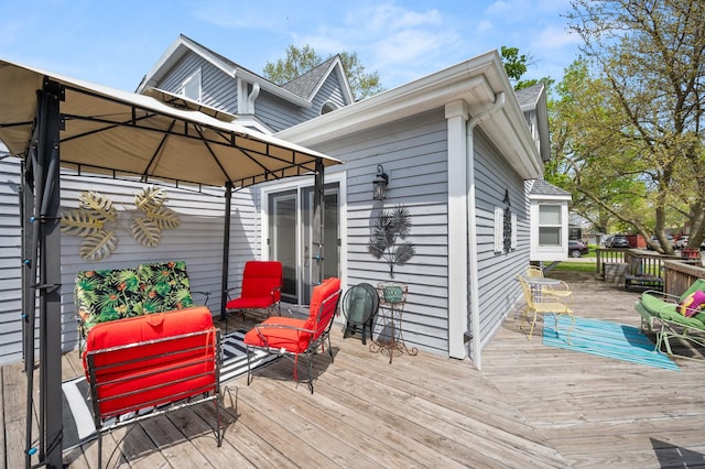wooden terrace with a gazebo