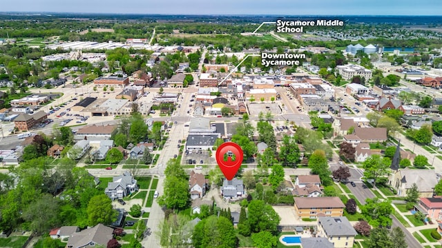 aerial view of property's location featuring nearby suburban area