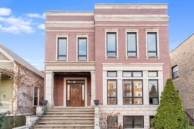 view of front of property with brick siding