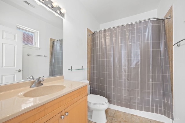 758 W 15th St Unit 3A, Chicago, IL 60607 - full bathroom with toilet, visible vents, a shower with shower curtain, tile patterned floors, and vanity