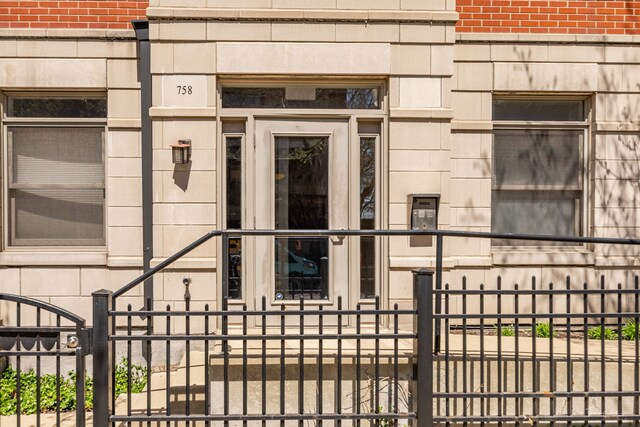 758 W 15th St Unit 3A, Chicago, IL 60607 - entrance to property featuring brick siding, fence, and a gate