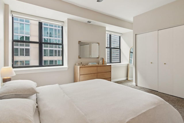 451 W Huron St Unit 1401, Chicago, IL 60654 - carpeted bedroom with a closet and baseboards
