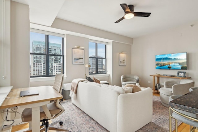 451 W Huron St Unit 1401, Chicago, IL 60654 - living room with wood finished floors, healthy amount of natural light, an office area, and a ceiling fan
