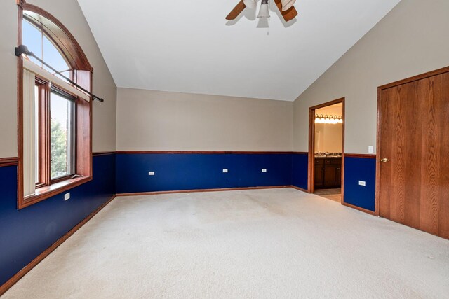 6248 Misty Pines Dr Unit 4, Tinley Park, IL 60477 - unfurnished bedroom with vaulted ceiling, carpet flooring, a wainscoted wall, ensuite bath, and a ceiling fan
