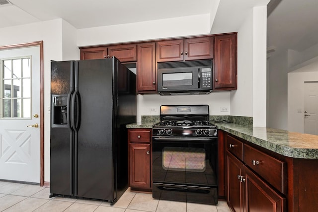 6248 Misty Pines Dr Unit 4, Tinley Park, IL 60477 - kitchen with black appliances, dark countertops, light tile patterned flooring, and a peninsula