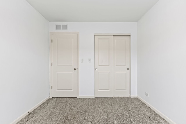 2344 Alison Ave, Pingree Grove, IL 60140 - unfurnished bedroom featuring carpet floors, a closet, and baseboards