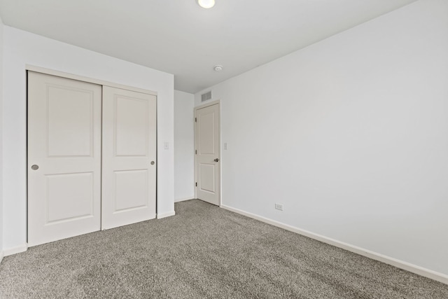 2344 Alison Ave, Pingree Grove, IL 60140 - unfurnished bedroom featuring carpet flooring, a closet, and baseboards