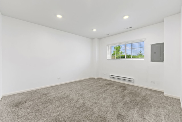 2344 Alison Ave, Pingree Grove, IL 60140 - carpeted empty room featuring a baseboard radiator, electric panel, recessed lighting, and baseboards