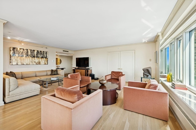 132 E Delaware Pl Unit 4901, Chicago, IL 60611 - living room with healthy amount of natural light, light wood-style floors, and crown molding