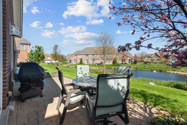 1147 Morgan St, Northbrook, IL 60062 - view of patio / terrace with a water view, outdoor dining area, a grill, and a residential view