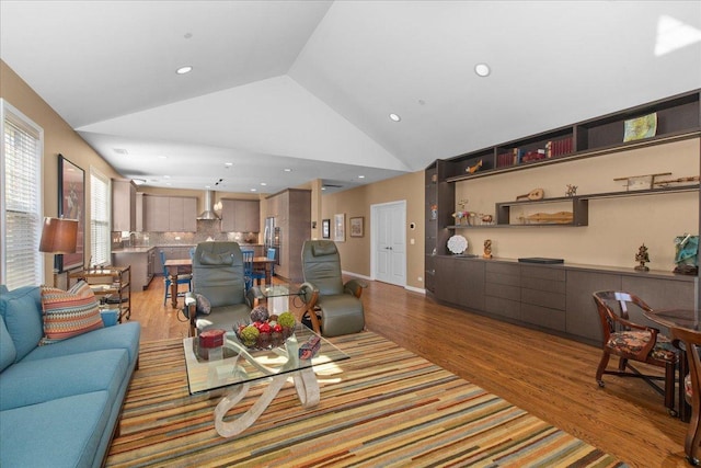 1147 Morgan St, Northbrook, IL 60062 - living room featuring light wood-style floors, vaulted ceiling, and recessed lighting