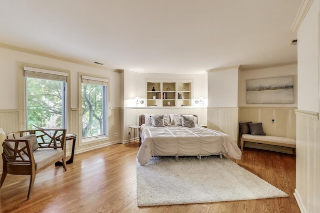 215 W Concord Ln, Chicago, IL 60614 - bedroom with a wainscoted wall, ornamental molding, and wood finished floors