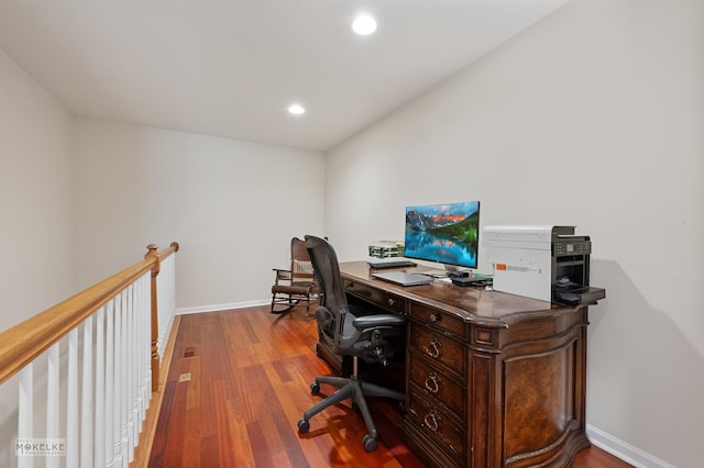 office with wood finished floors, baseboards, and recessed lighting