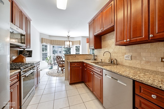 1254 Townes Cir, Aurora, IL 60502 - kitchen with stainless steel appliances, decorative backsplash, light stone counters, light tile patterned flooring, and pendant lighting