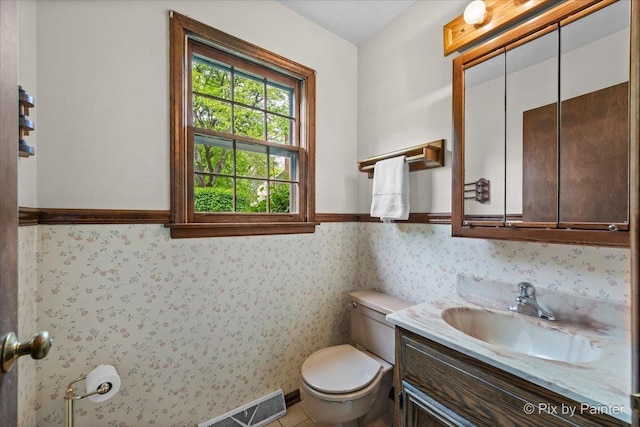 50 Southgate Crse, Saint Charles, IL 60174 - half bathroom featuring toilet, vanity, and wainscoting