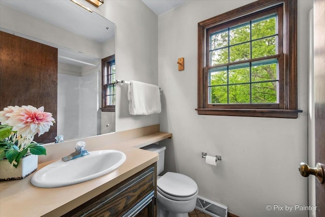 50 Southgate Crse, Saint Charles, IL 60174 - bathroom with toilet, vanity, and baseboards