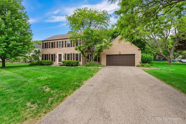 50 Southgate Crse, Saint Charles, IL 60174 - colonial-style house with asphalt driveway, an attached garage, and a front lawn
