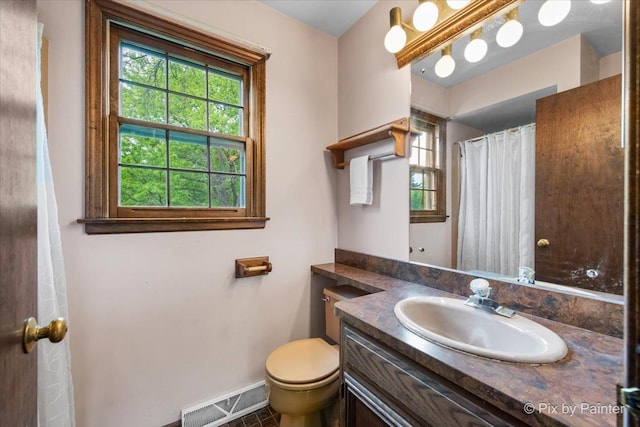 50 Southgate Crse, Saint Charles, IL 60174 - bathroom with vanity, toilet, baseboards, and curtained shower